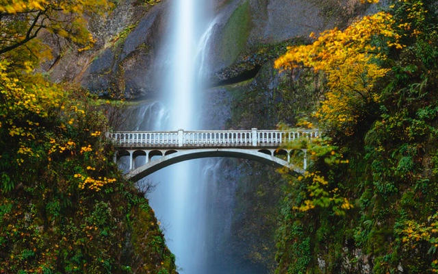 Bridge with a waterfall in the background